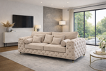 Beige sofa in a modern living room with large windows and decorative elements.